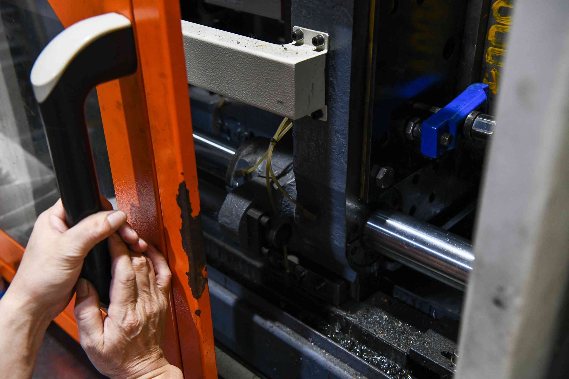 Internal view of a CNC machine showing precision tooling components at HAO Eyewear